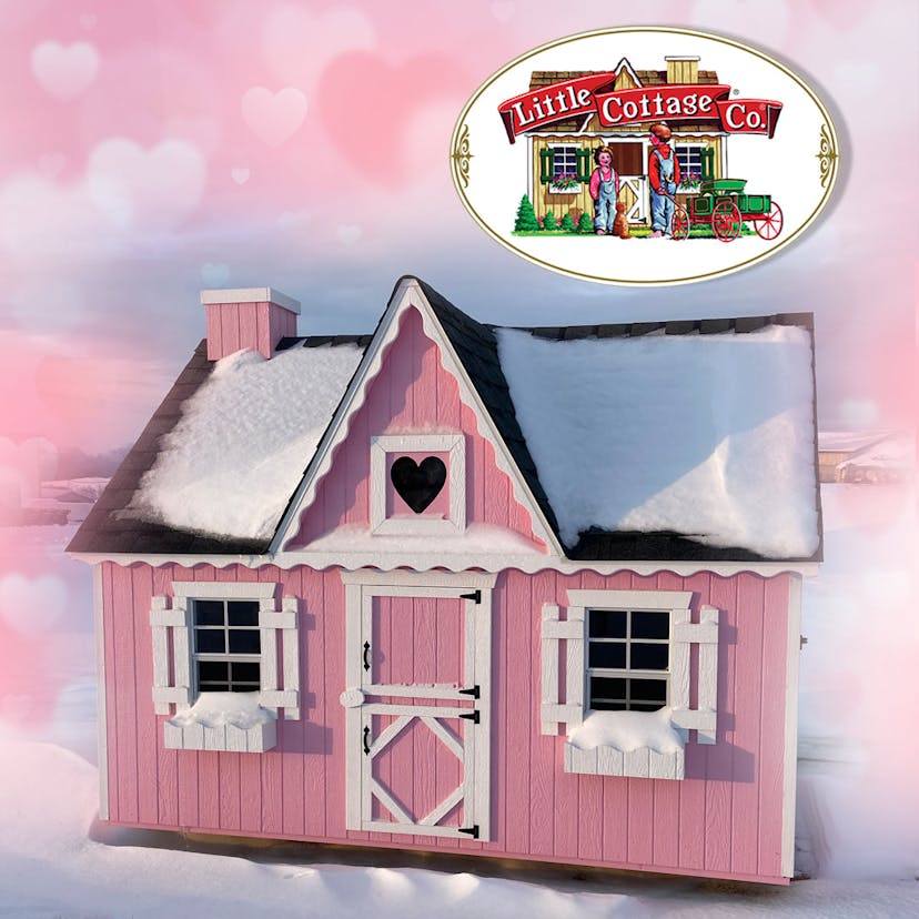 Pink playhouse with white gingerbread trim covered in snow in winter. Pink background with hearts.