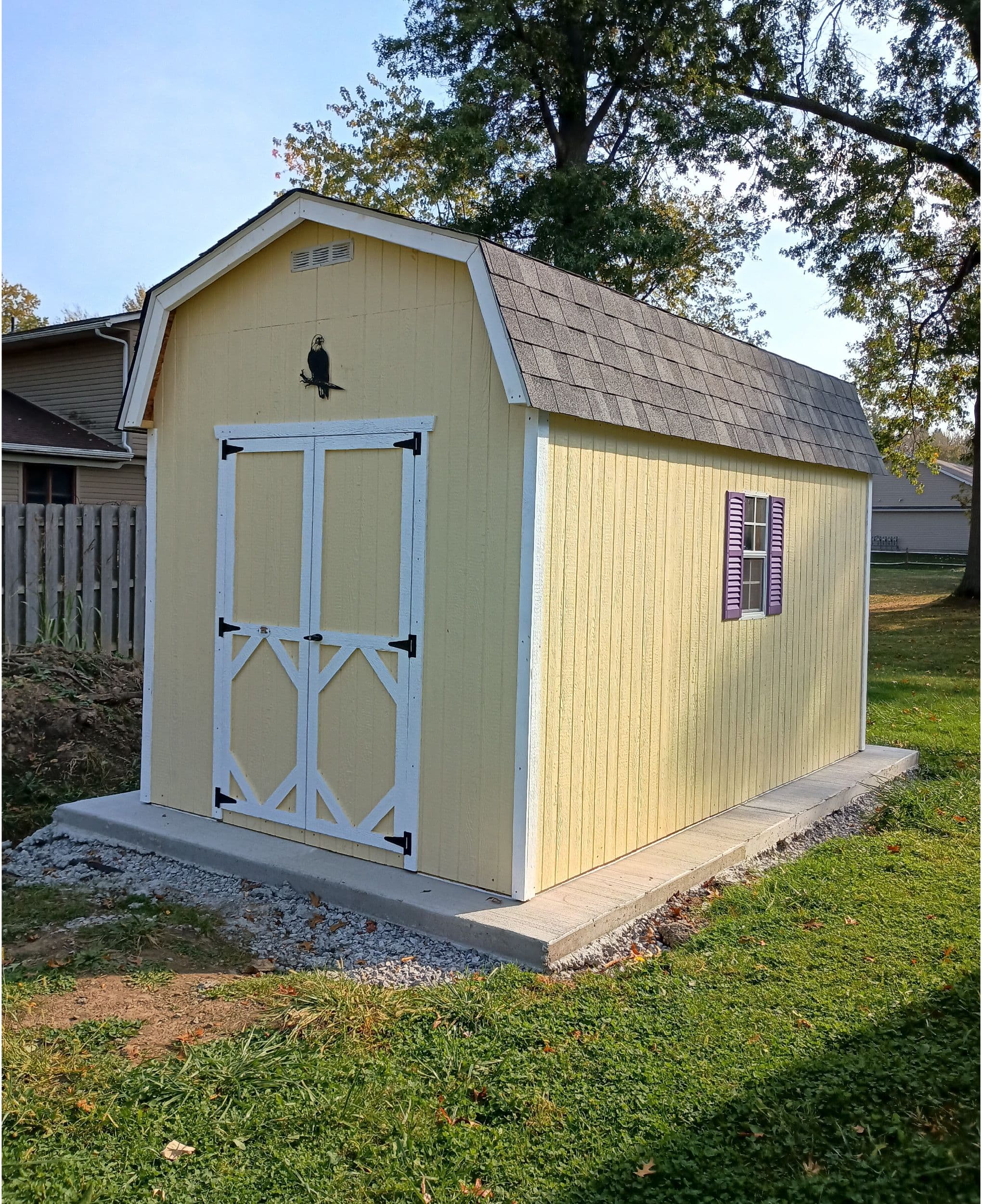 classic gambrel barn wood shed on pad